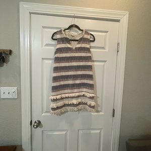 Anthropology holding horses dress